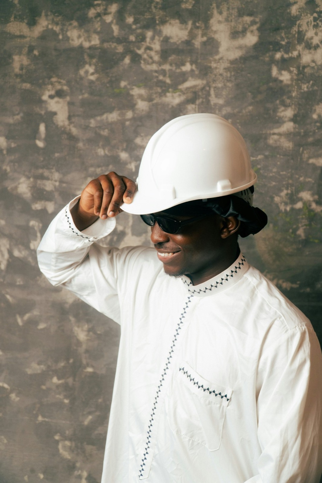 A BANEC site supervisor in a hard hat.